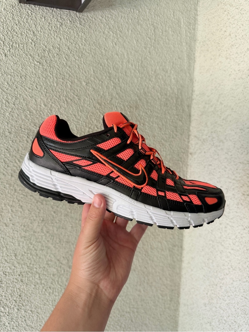 Nike orange and black p6000